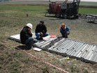 Geologists core-logging at Vele Project. (March 2009)